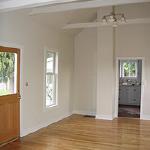 An old fir floor was brough back to life.  The chimney was boxed in and sheetrocked.