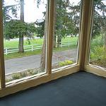 Black Richlite flooring was installed and full height insulated glass units take advantage of the view.